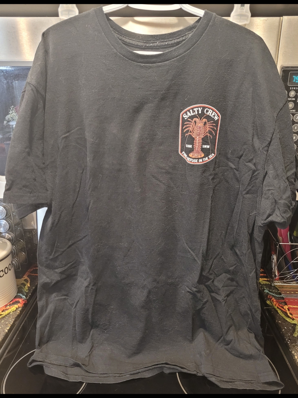 Salty Crew Black Graphic Tee with Coral Lobster Logo